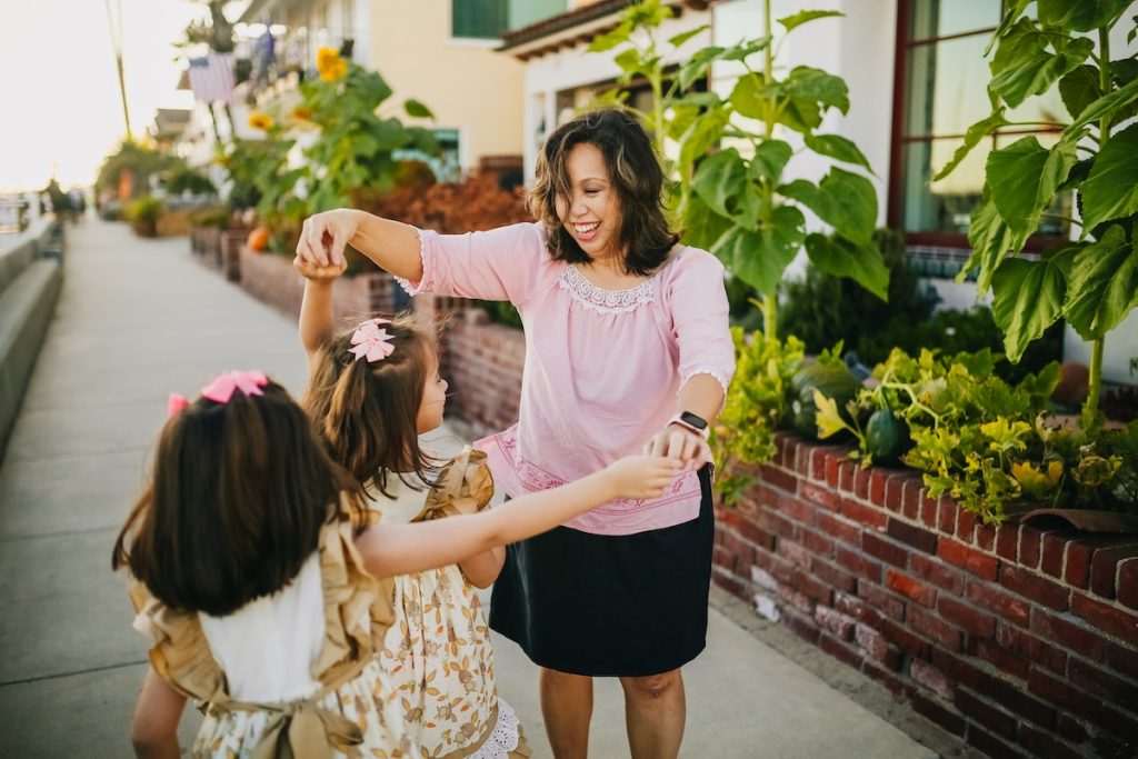 single mom with her daughters