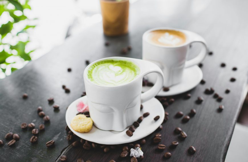 cups of matcha and coffee on a table
